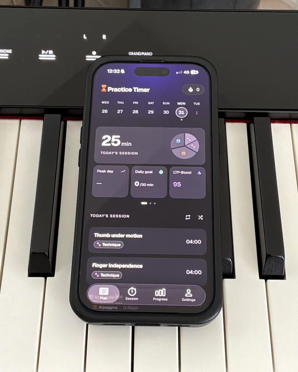 Practice Timer's plan screen on an iPhone lying on the keys of a digital piano, showing a 25-minute session, an LTP-Boost score of 95, and two named technique exercises of four minutes each.